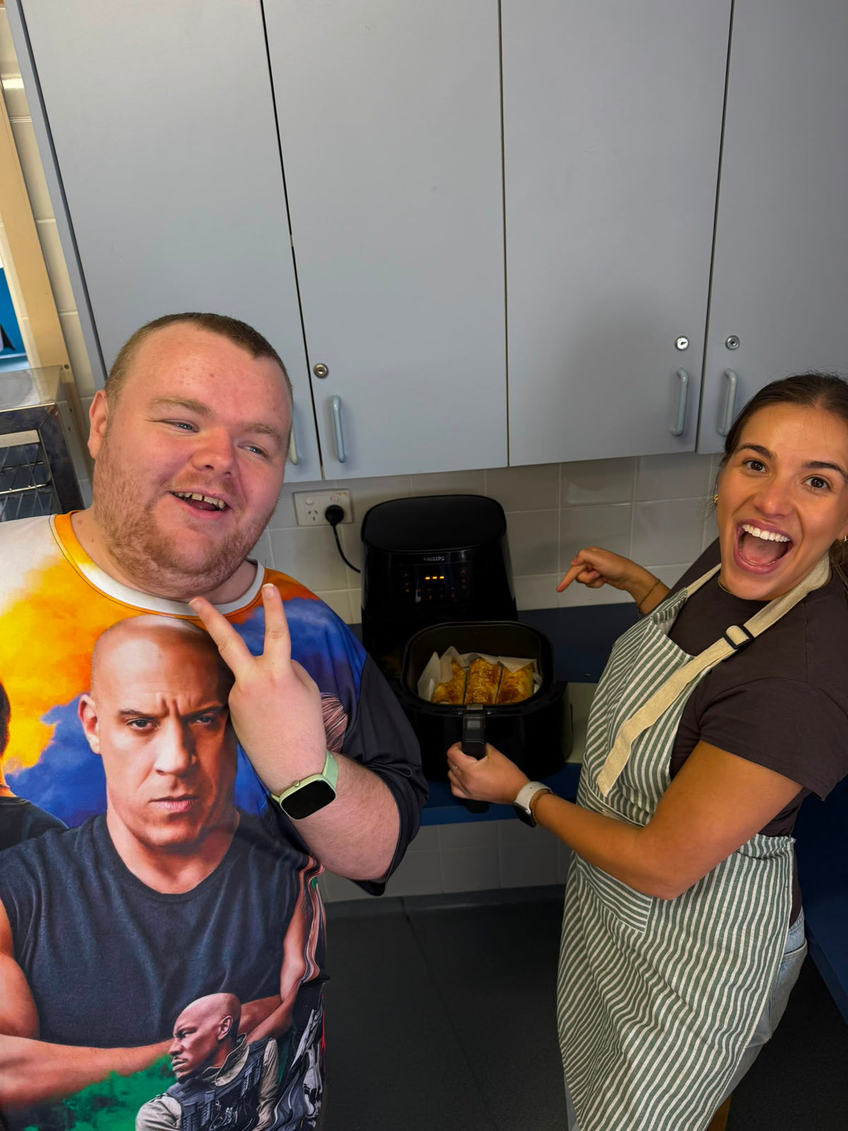 Guests cooking together at a Travel Buddy Adventures cooking class