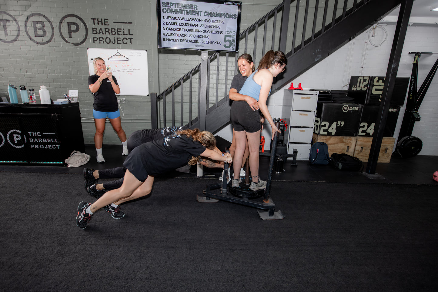 Guests training with support staff at Gym Buddies