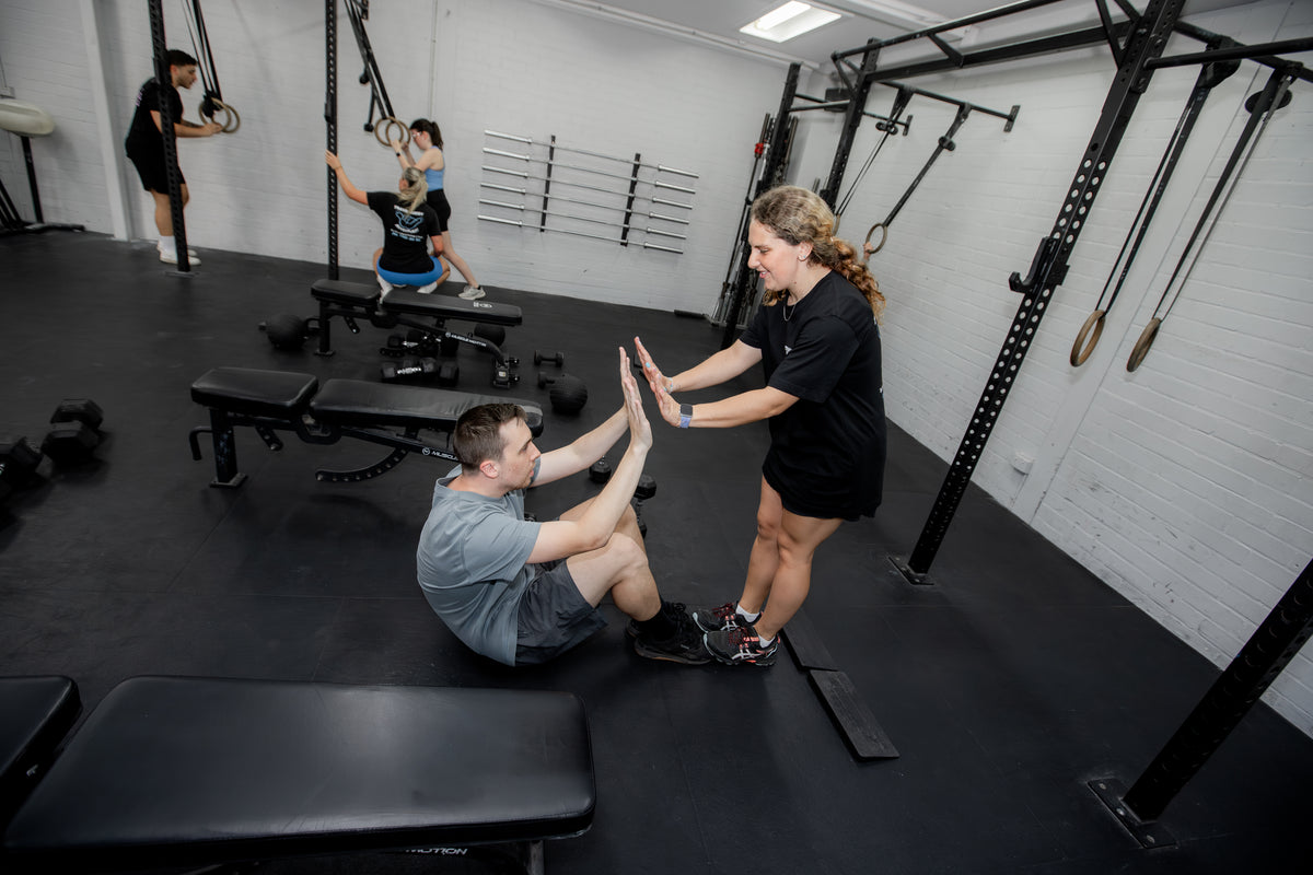 Guests working out at a Travel Buddy Adventures Gym Buddies session