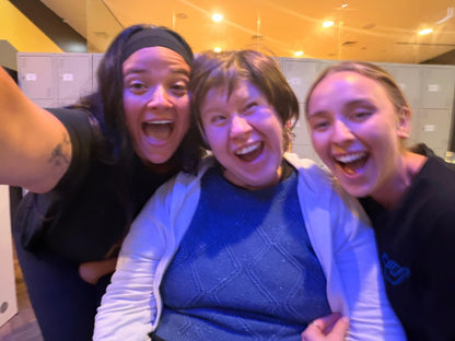 Guests enjoying Bowling & Dinner with Travel Buddy Adventures