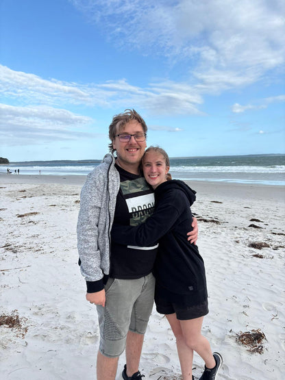 Guests enjoying End of Year Beach Day & BBQ with Travel Buddy Adventures