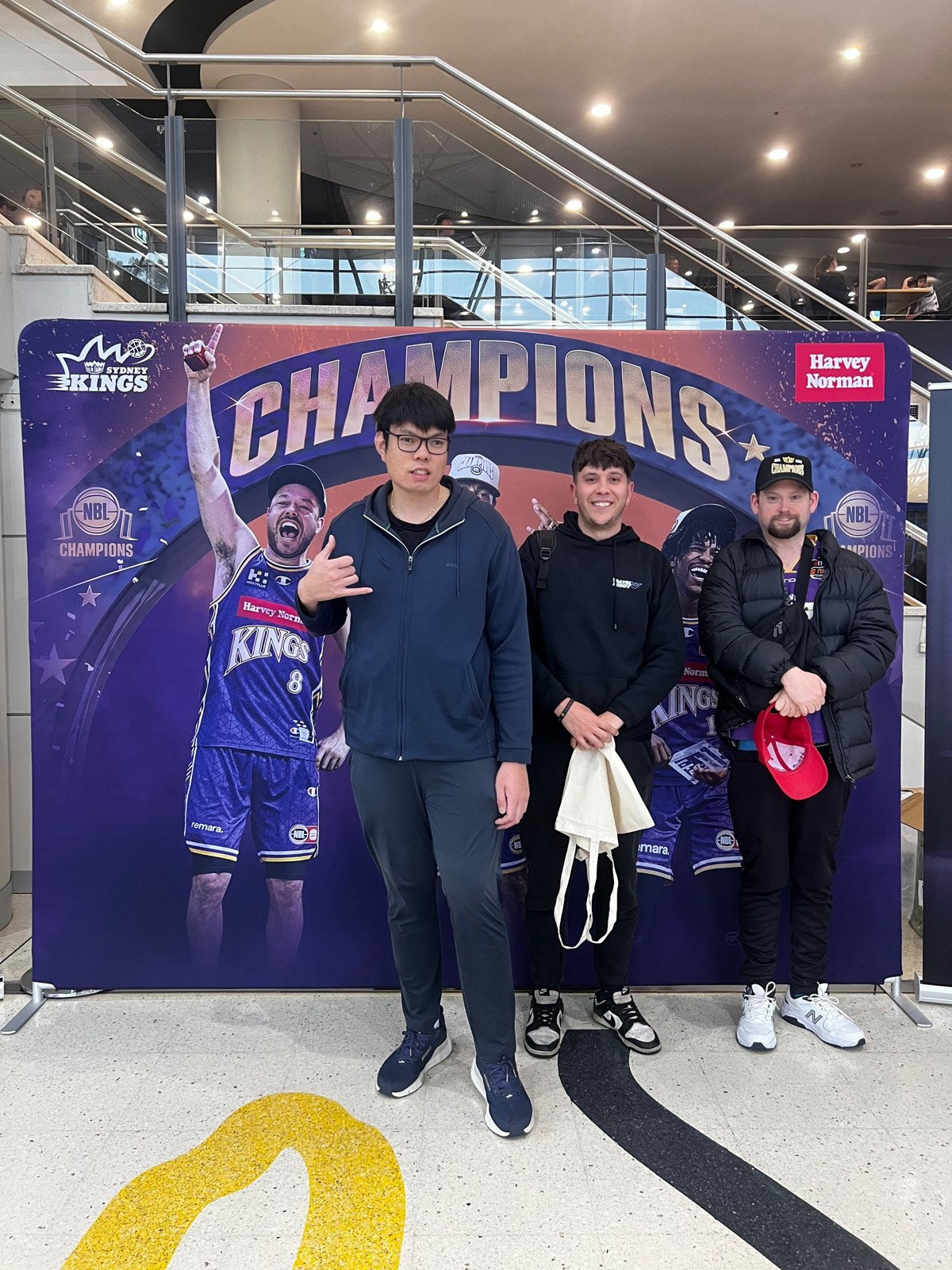 Guests enjoying Sydney Kings vs Perth Wildcats with Travel Buddy Adventures