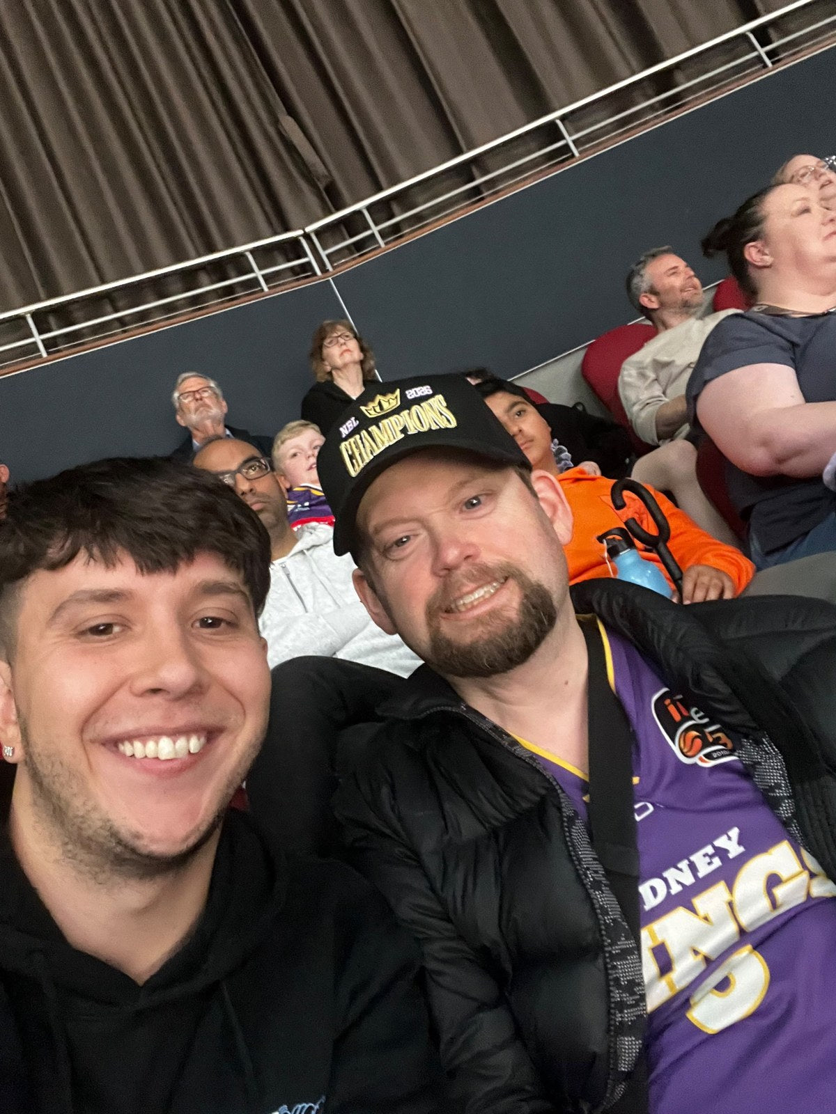 Guests enjoying Sydney Kings vs Perth Wildcats with Travel Buddy Adventures