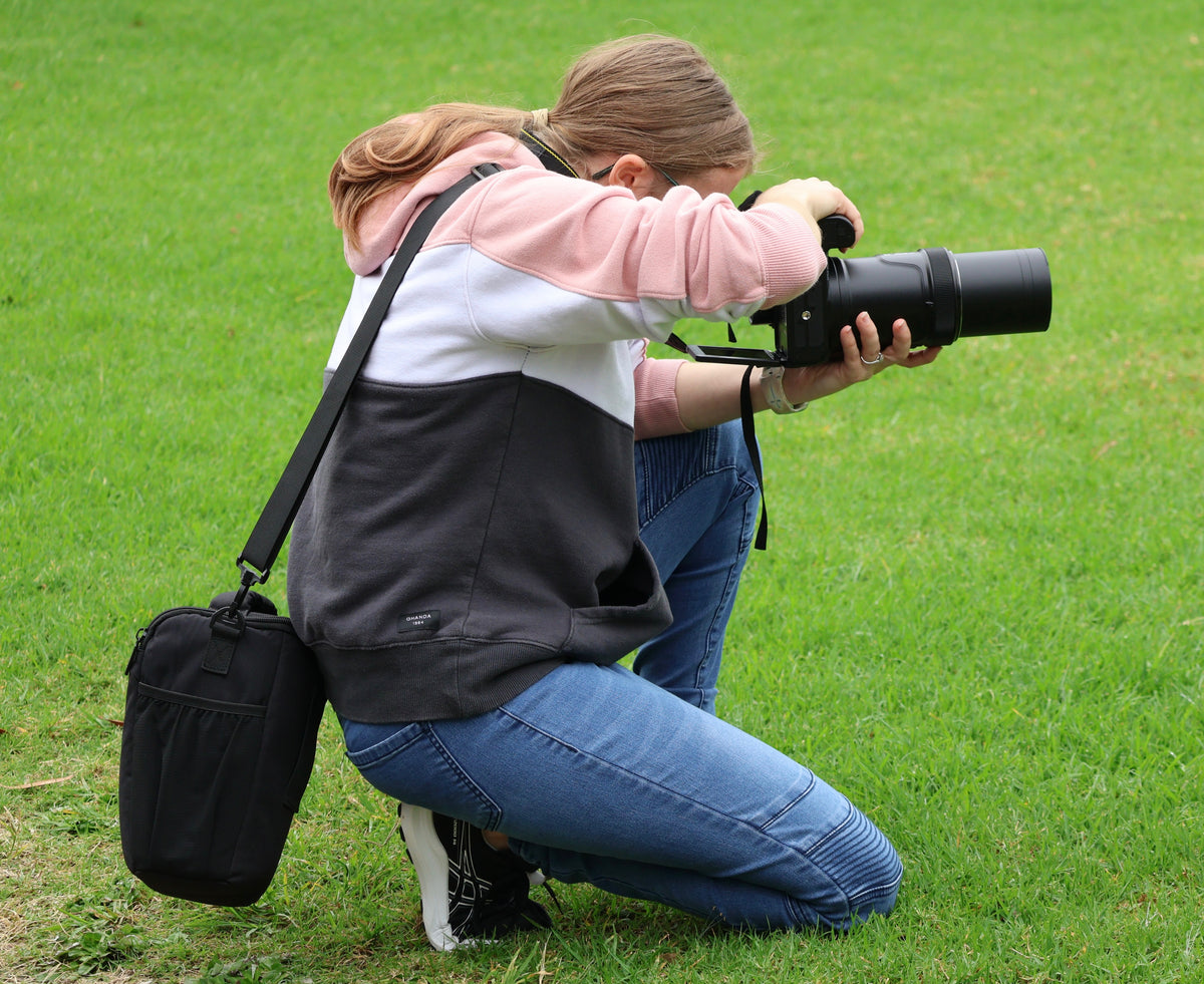 Guests taking photographs on a Photography Club outing