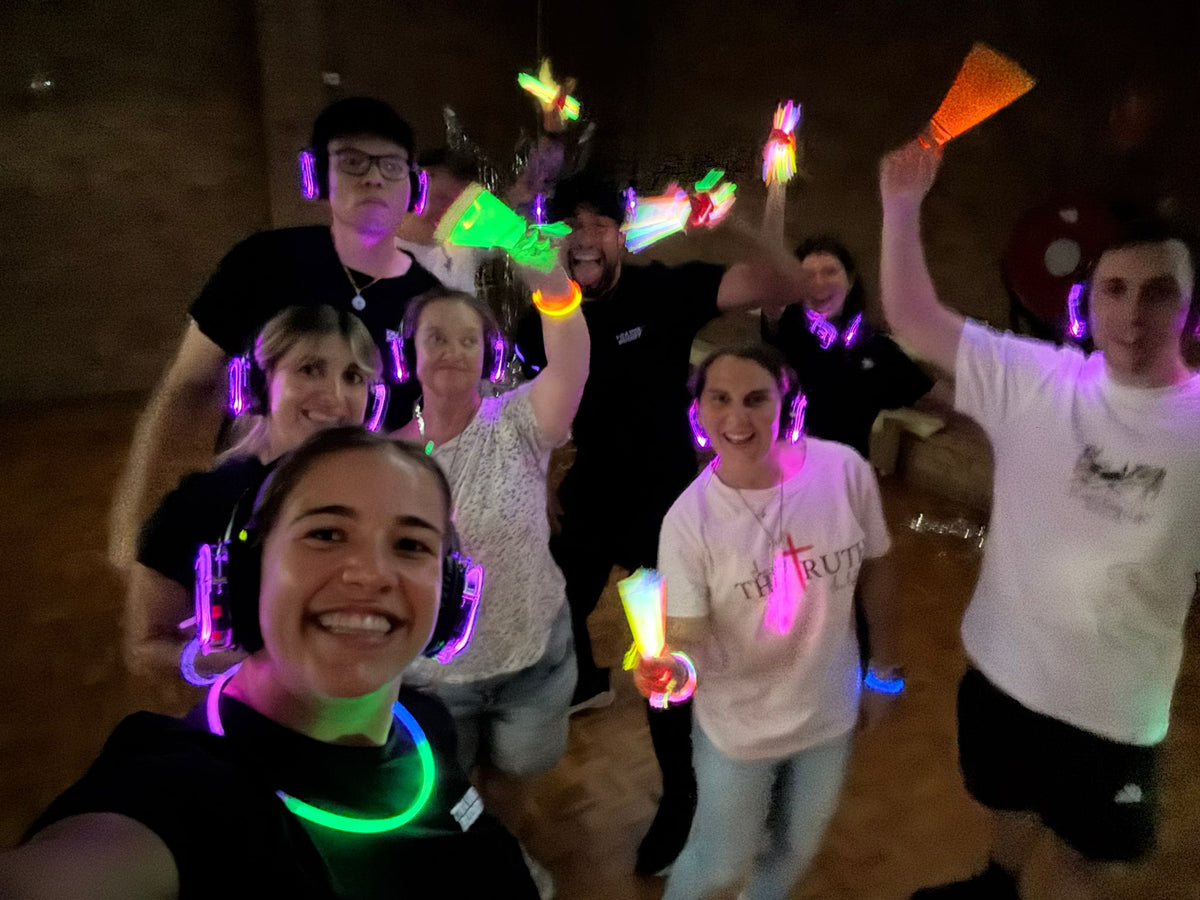 Guests dancing at a Travel Buddy Adventures silent disco