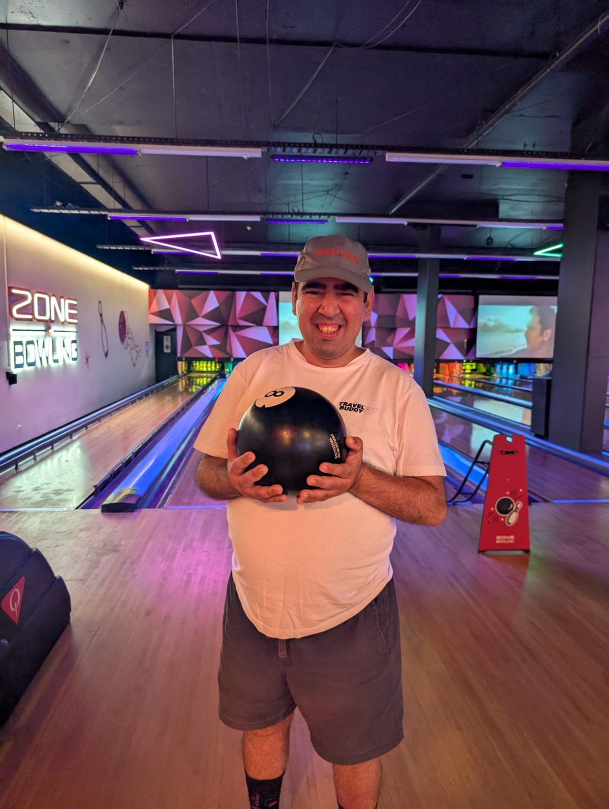 Guests enjoying a Travel Buddy Adventures bowling and dinner night